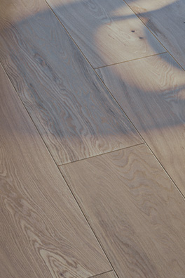 Close-up image of high quality light oak-colored wood flooring