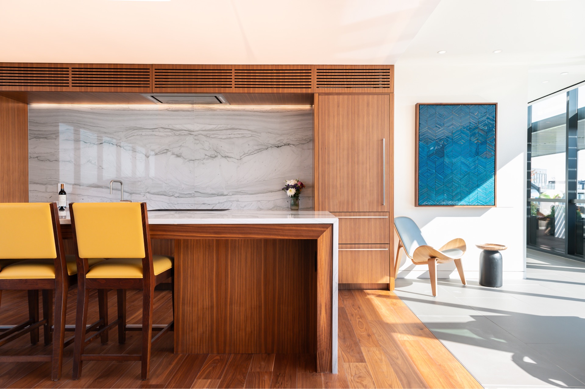 Margarite luxury apartments' rooftop lounge with expansive island & bar area in Washington, DC.